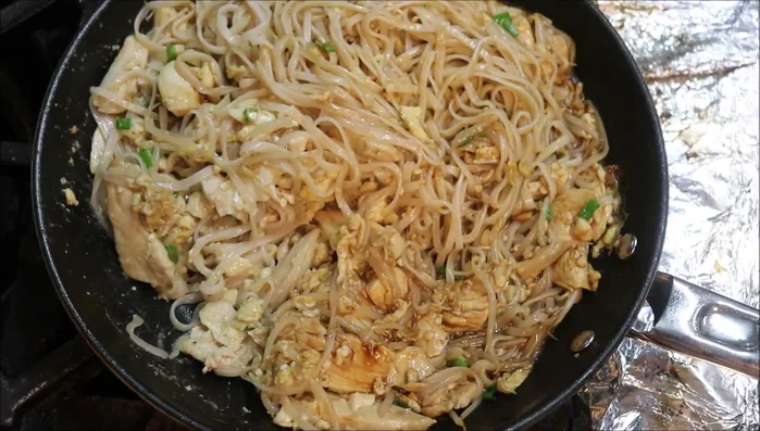 Cook and serve: Cook for 1.5-2 minutes, until everything is heated through and the noodles are coated in sauce. Garnish with lemon wedges, peanuts, and coriander (optional).