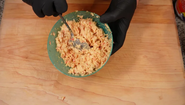 Add green onions to the crab mixture and refrigerate.