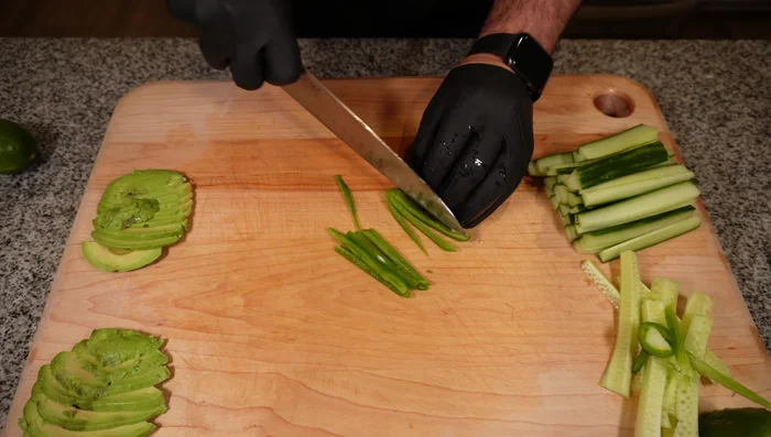 Soak rice paper wrappers in warm water.