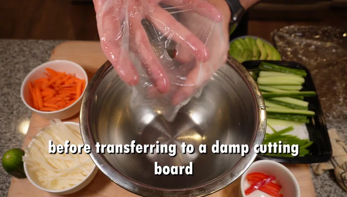 Place the crab mixture and vegetables onto the softened rice paper wrappers.