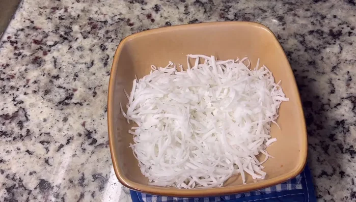 Once the coconut is cooked, sprinkle with salt to taste.