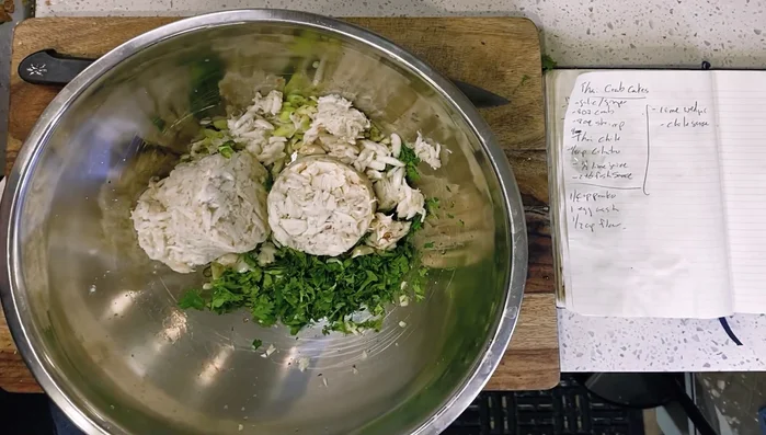 Add lime juice, fish sauce, and flour to the crab mixture; mix well.