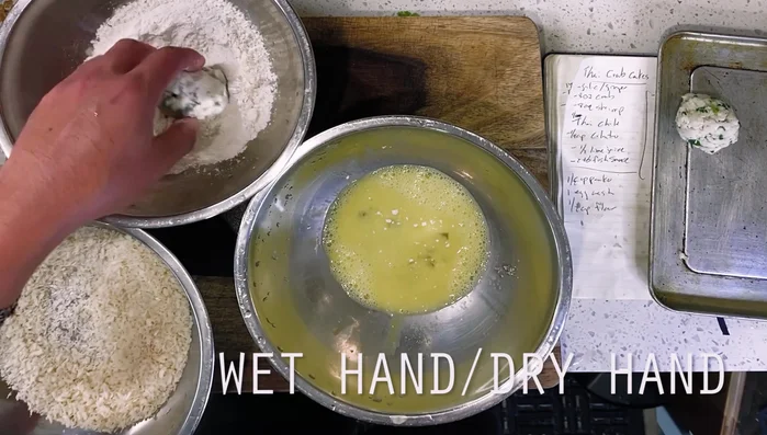 Bread the crab balls: coat in flour, then egg, then panko.
