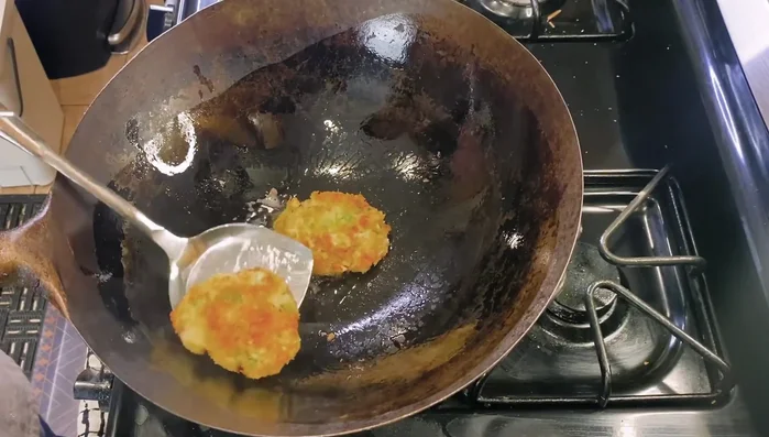 Remove crab cakes and place on a drying rack to cool.
