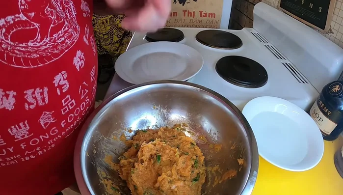 Wet your hands slightly to prevent sticking. Form the mixture into patties.