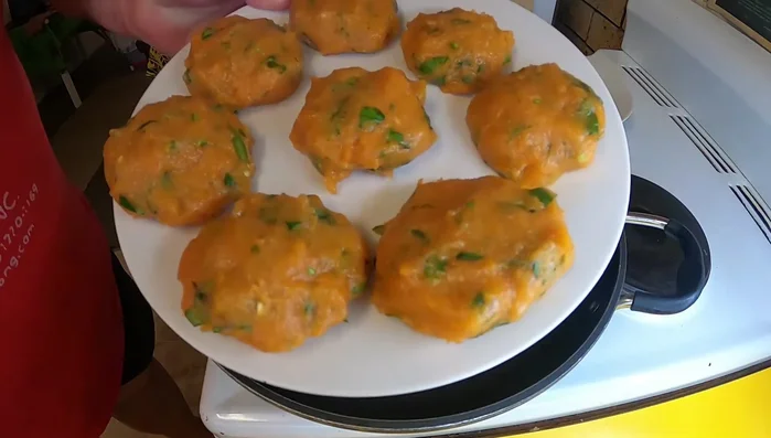 Heat oil in a frying pan over medium-high heat. Shallow fry the patties, cooking until golden brown and cooked through, flipping carefully.