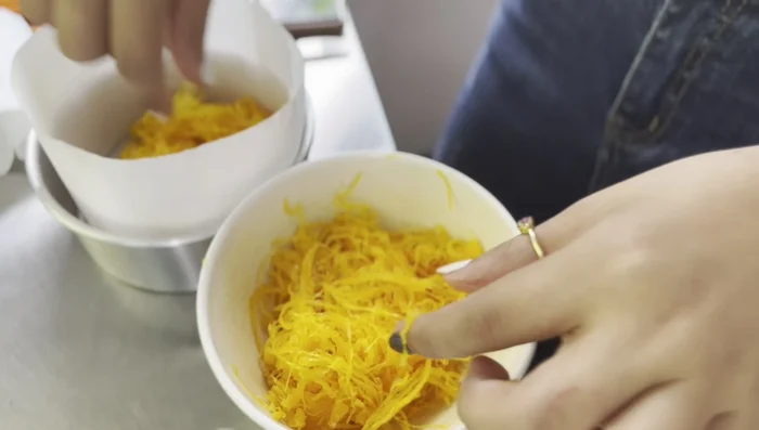 Prepare your coconut chiffon cake batter (recipe not included in this transcript).