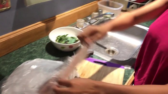 In a bowl, mix the Thai red curry paste, coconut milk, fish sauce, lime juice, and sugar. (Note: Exact measurements are not in the transcript)