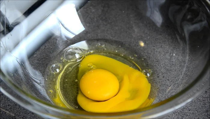In a mixing bowl, whisk 4 eggs at room temperature until fluffy and light.