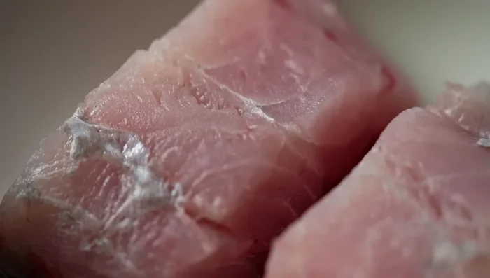 Season the fish with salt.
