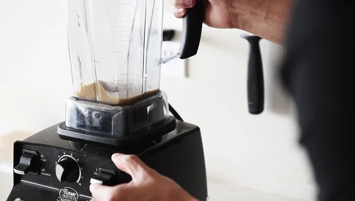 Prepare spicy soy sauce: Combine soy sauce, chili, and sesame oil (optional).