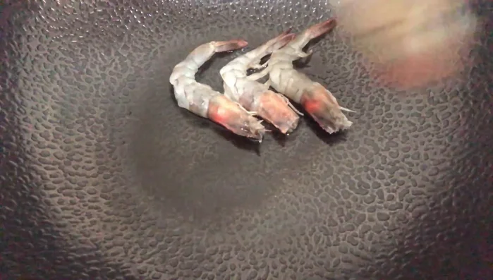 Cook the shrimp: Add 2 tablespoons of vegetable oil to a pan and cook shrimp until done. Remove from pan.