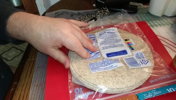 Fry the tortilla until heated and slightly crispy. (optional)