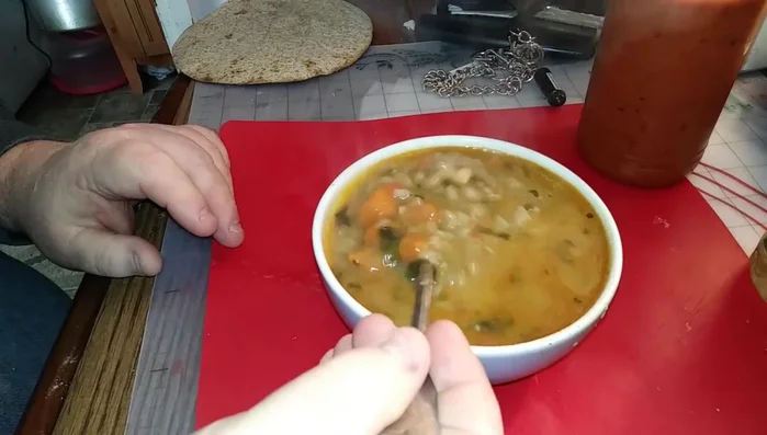 Once the soup is heated, pour it into a bowl.