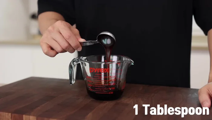 Prepare the sauce: Combine fish sauce, soy sauce, black soy sauce, oyster sauce, and sugar in a small bowl. Mix well. Optional: Use a mix of soy sauce and Cold Mountain sauce for an enhanced flavor.