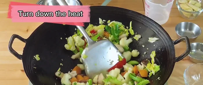 Pour in the stir-fry sauce (oyster sauce, golden mountain sauce, fish sauce, sugar, water).