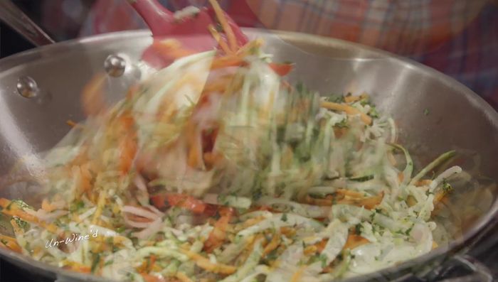 Add the Pad Thai sauce to the pan, stir well to combine.