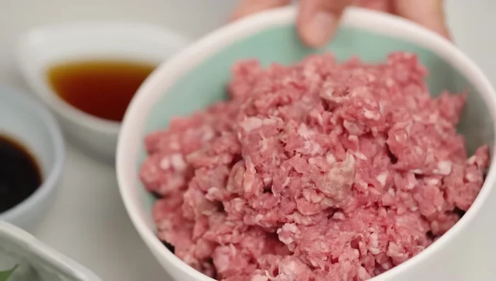Prepare your protein (pork and beef mix used in the example).