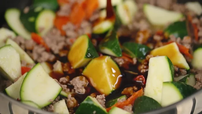 Pour the stir-fry sauce over the ingredients and toss to combine.