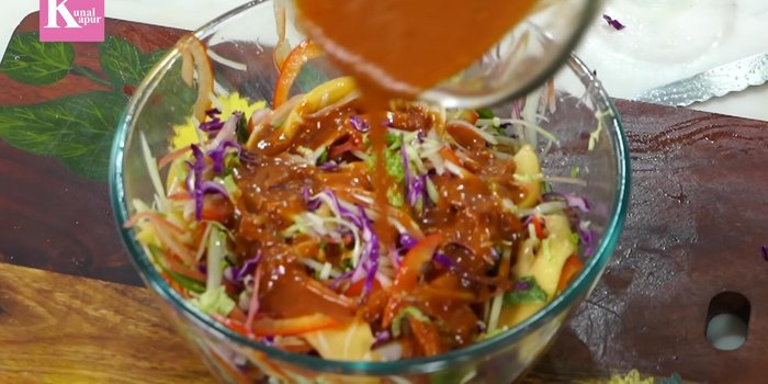 Combine everything: In a bowl, gently mix the vegetables and fruits with the dressing. Add mint leaves, salt, and a squeeze of lemon juice.