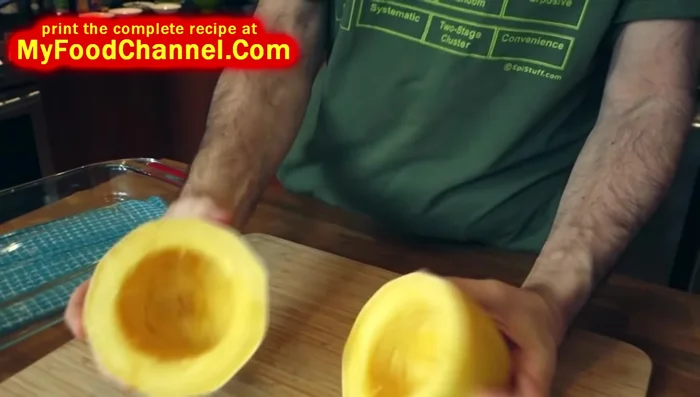 Once cooled, use a fork to shred the squash into spaghetti-like strands.
