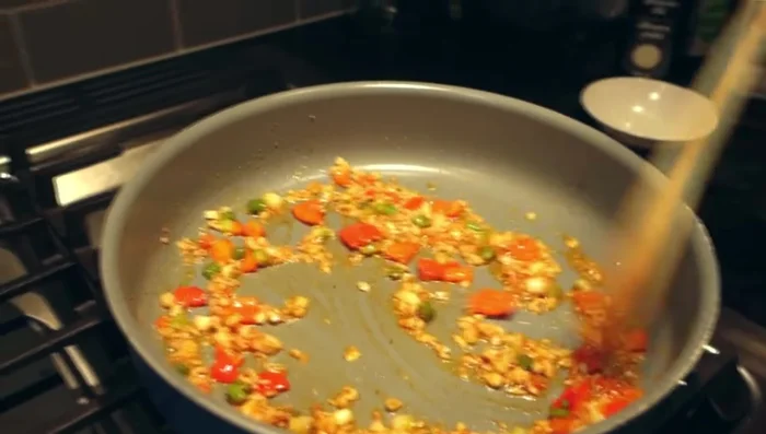 Add rice vinegar, fish sauce/tamari, peanut butter, and a little water. Stir to combine.
