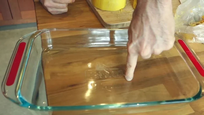 Place the squash halves face down in a little water in an oven-safe dish.