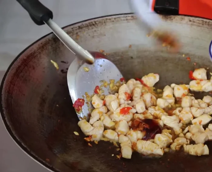 Add light soy sauce, oyster sauce, sugar, and dark soy sauce. Add a little water if it gets dry.