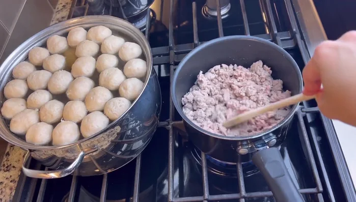 Prepare the meat: Cook ground turkey or ground pork in a separate pot until cooked through. Prepare pork meatballs (optional).