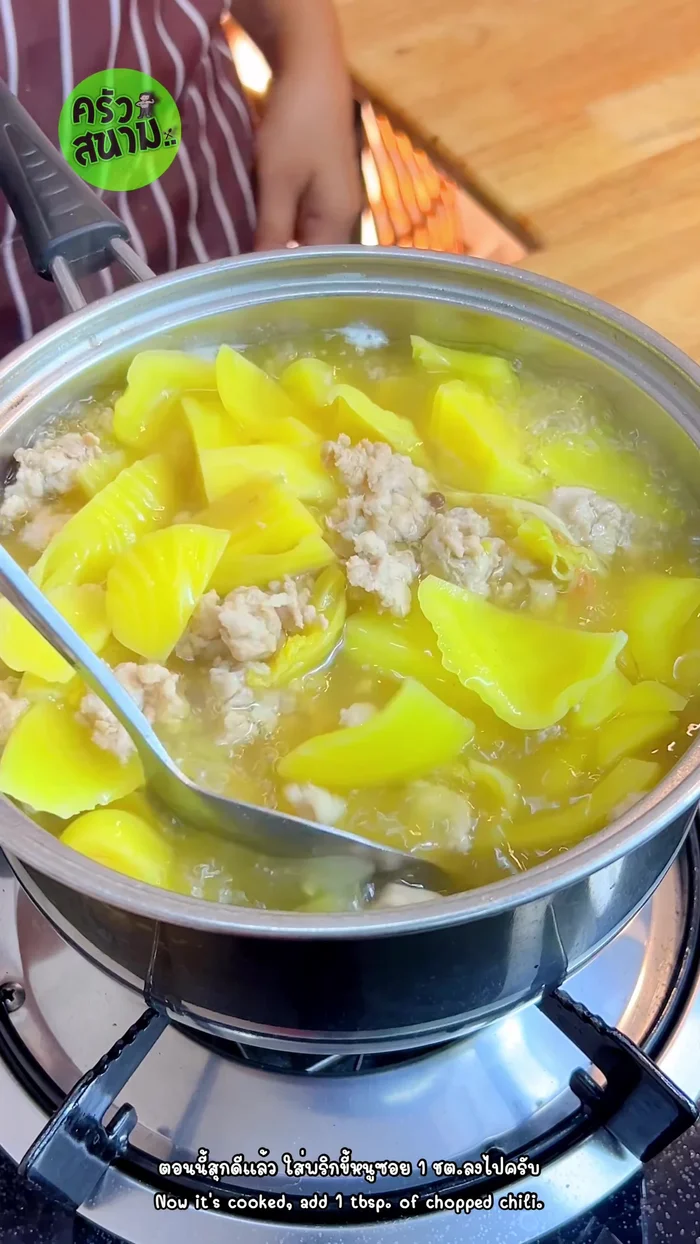 Add chili and lime juice: Add chopped chili, mix, then turn off the heat. Stir in freshly squeezed lime juice.