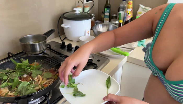Stir in Thai basil.