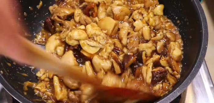 Continue to stir-fry until the chicken is cooked through and the mushrooms are tender.