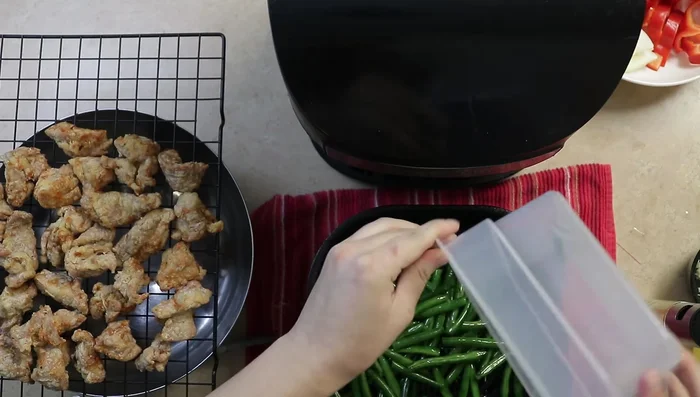 Air fry string beans for 2 minutes (or use a wok).
