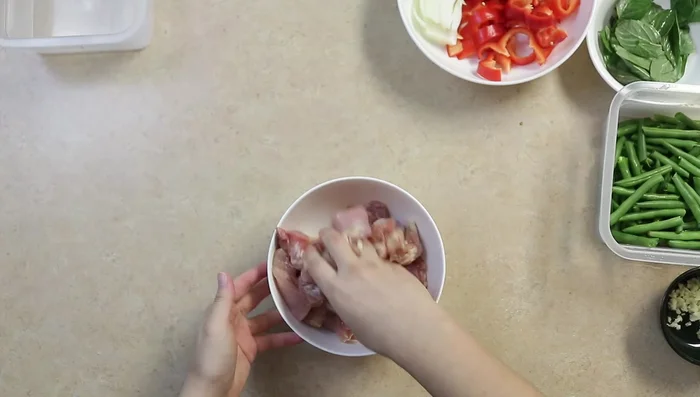 In a bowl, mix chicken with egg white.