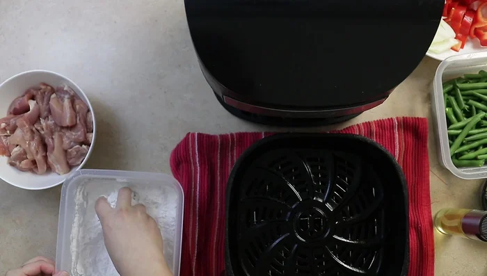 Air fry chicken for 12 minutes, spray with oil halfway through. Repeat with remaining chicken.