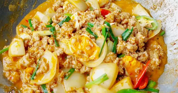 Serve hot with rice and fresh vegetables.
