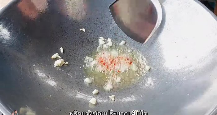 Add sliced red chili and stir-fry until fragrant (adjust amount to your spice preference).