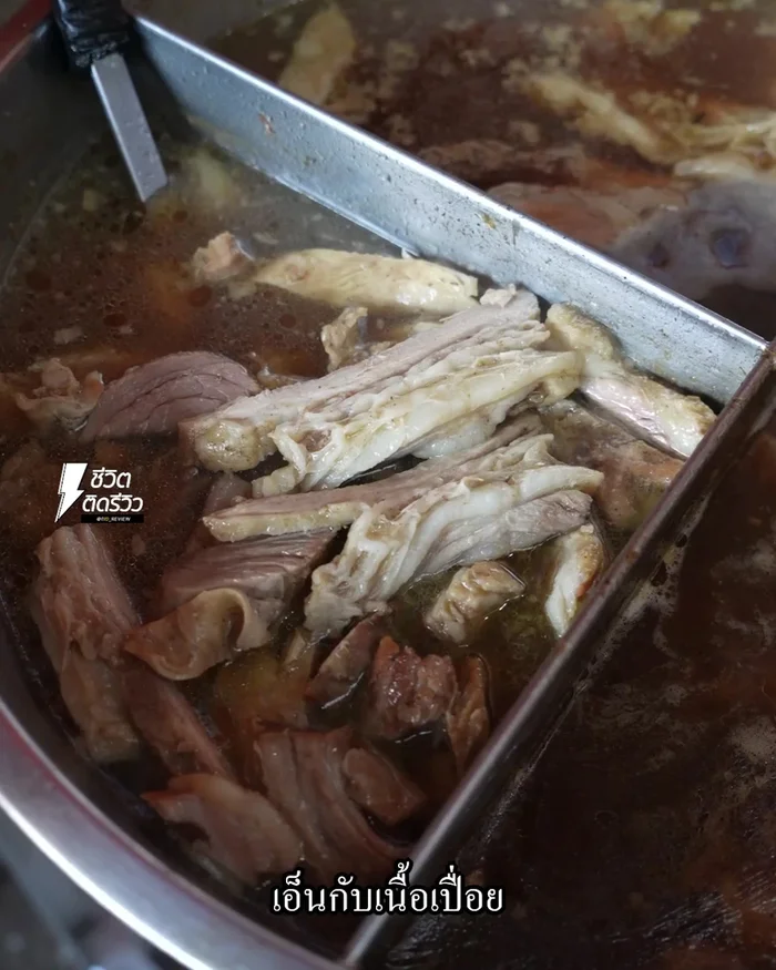 Serve the stewed pork leg with rice and the beef noodle soup. Garnish with fresh chilies as preferred by the customer.