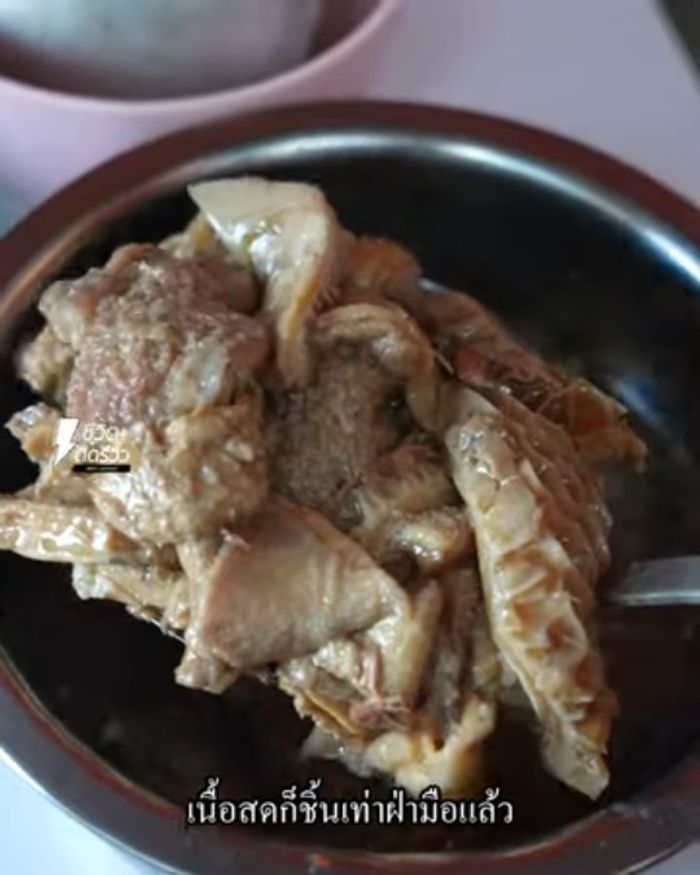 Once the pork legs are cooked, you can incorporate the salted egg filling into the pork legs if desired.