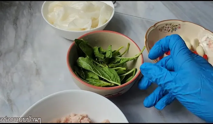 Pound the chili and garlic in a mortar and pestle.