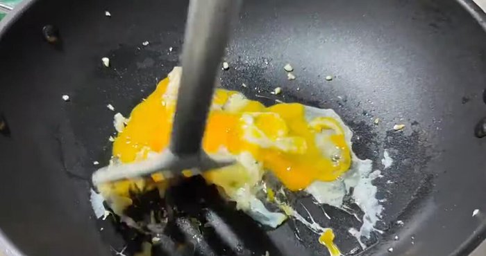 Add the eggs and stir-fry until cooked.