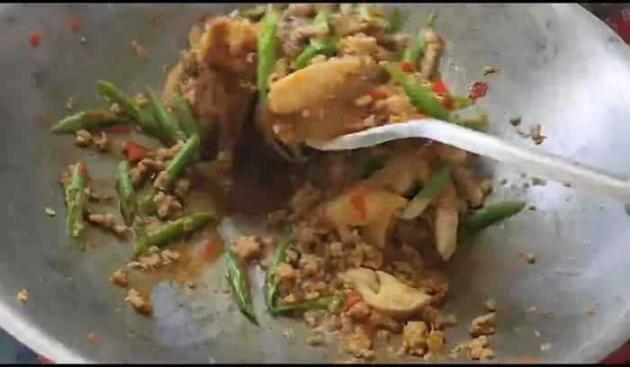 Add dark soy sauce (optional, for color).