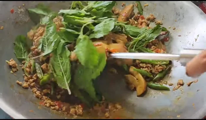 Add basil leaves.