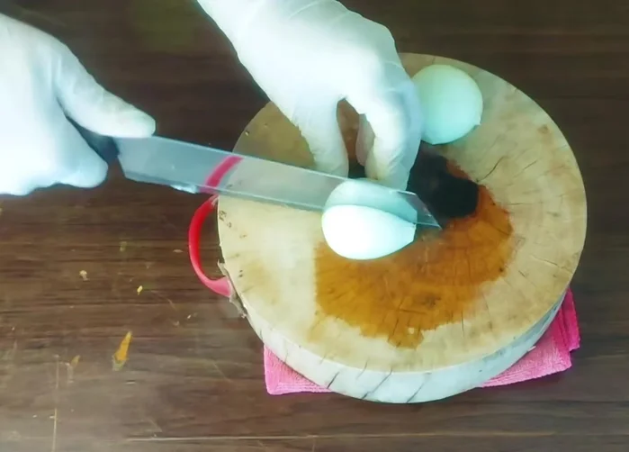 Cut the onion into 4 pieces (or use more as needed).