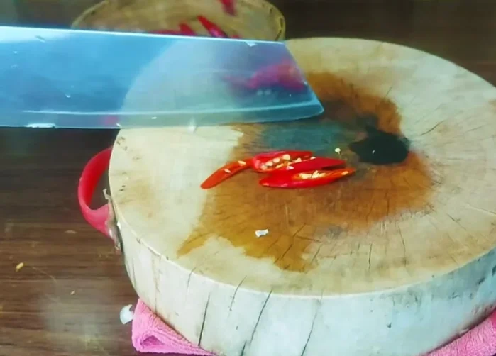 Cut red chili peppers into pieces (or use bell peppers for variety).