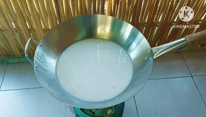 Add coconut milk to the pot and bring to a boil. Add the chicken, and don't stir until the chicken is cooked.