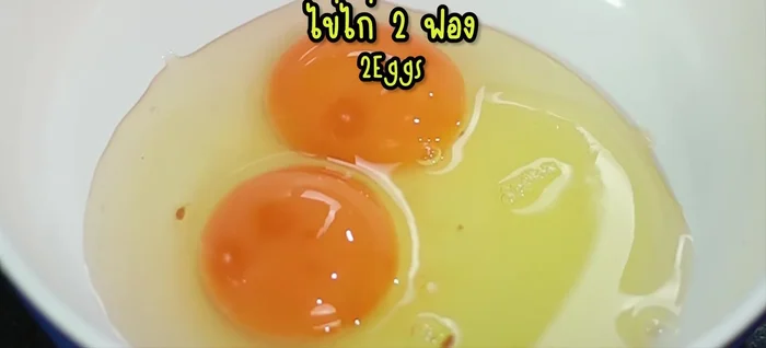Beat 2 eggs until smooth.