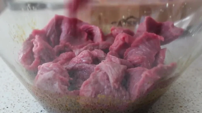 Marinate the beef: Add the beef strips to the marinade and mix thoroughly for about a minute, ensuring all pieces are coated. Cover and marinate for 2-4 hours (2 hours is ideal).