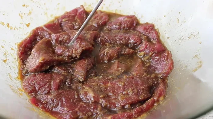 Assemble the skewers: Thread the marinated beef onto metal skewers, ensuring the pieces are touching but not tightly packed.