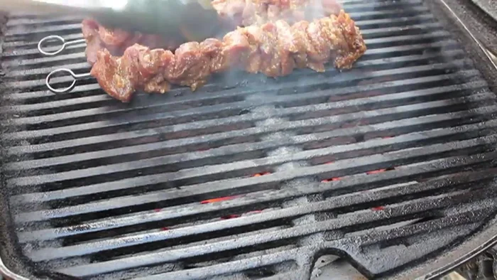 Grill the beef satay: Grill the skewers over high heat for approximately 6 minutes, turning and rotating frequently to ensure even cooking and caramelization. Cook until desired doneness is reached. Internal temperature should be safe for consumption.